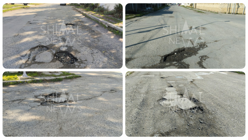 Qubanın mərkəzi küçəsi çuxurlara qərq olub