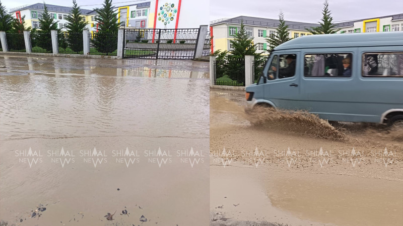 Qubada hər yağışda gölə dönən məktəb yolu