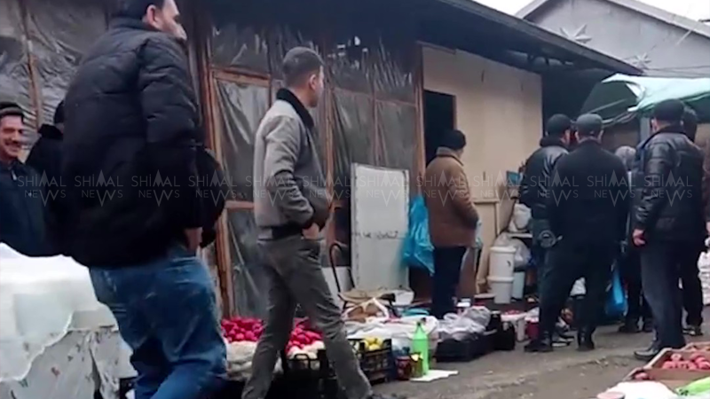 Quba bazarında qadının açıq-saçıq geyimi qalmaqal yaratdı - VİDEO