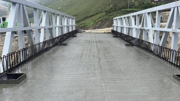 Qusarda sel sularının zədələdiyi yol və körpülər bərpa edilib