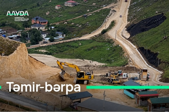 Qusarda selin dağıtdığı yolda bərpa işləri aparılır