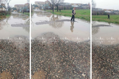 Timiryazev sakinləri yolu suyun içi ilə gedirlər - FOTO