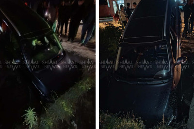 Qubada təhlükəli yol: daha bir avtomobil su kanalına düşdü – VİDEO