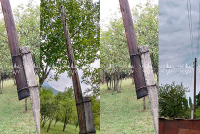 Xanəgahın çürüyən, aşmaq üzrə olan işıq dirəkləri