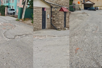 Xaçmazın mərkəzində yamaqlı, çala-çuxurlu yol